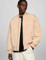 detail Tommy Jeans pánský béžový bomber