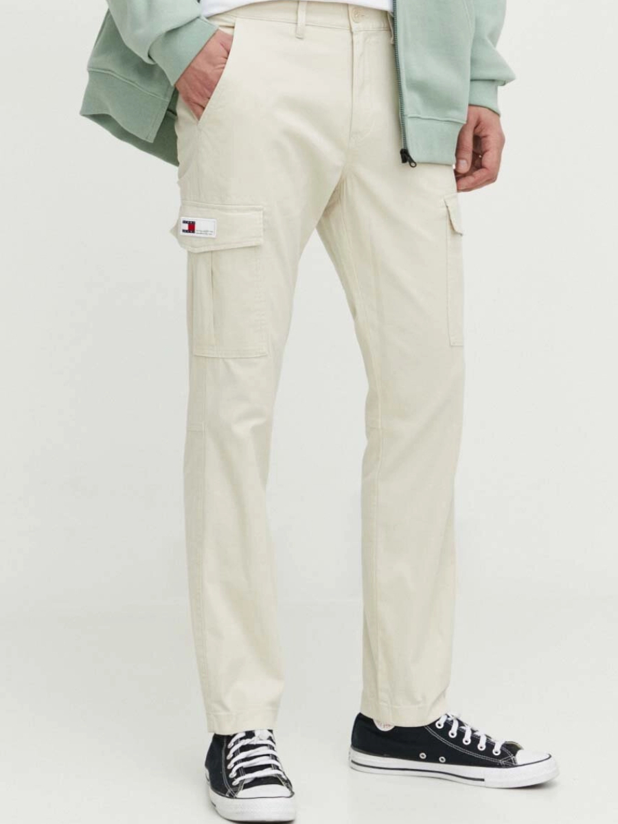 detail Tommy Jeans pánské krémové kalhoty