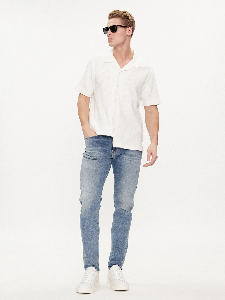 detail Calvin Klein pánské modré džíny