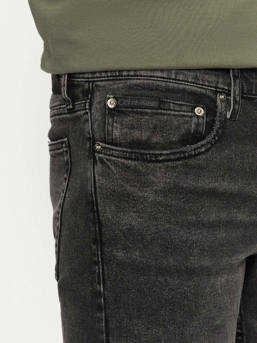 detail Calvin Klein pánské šedé džíny