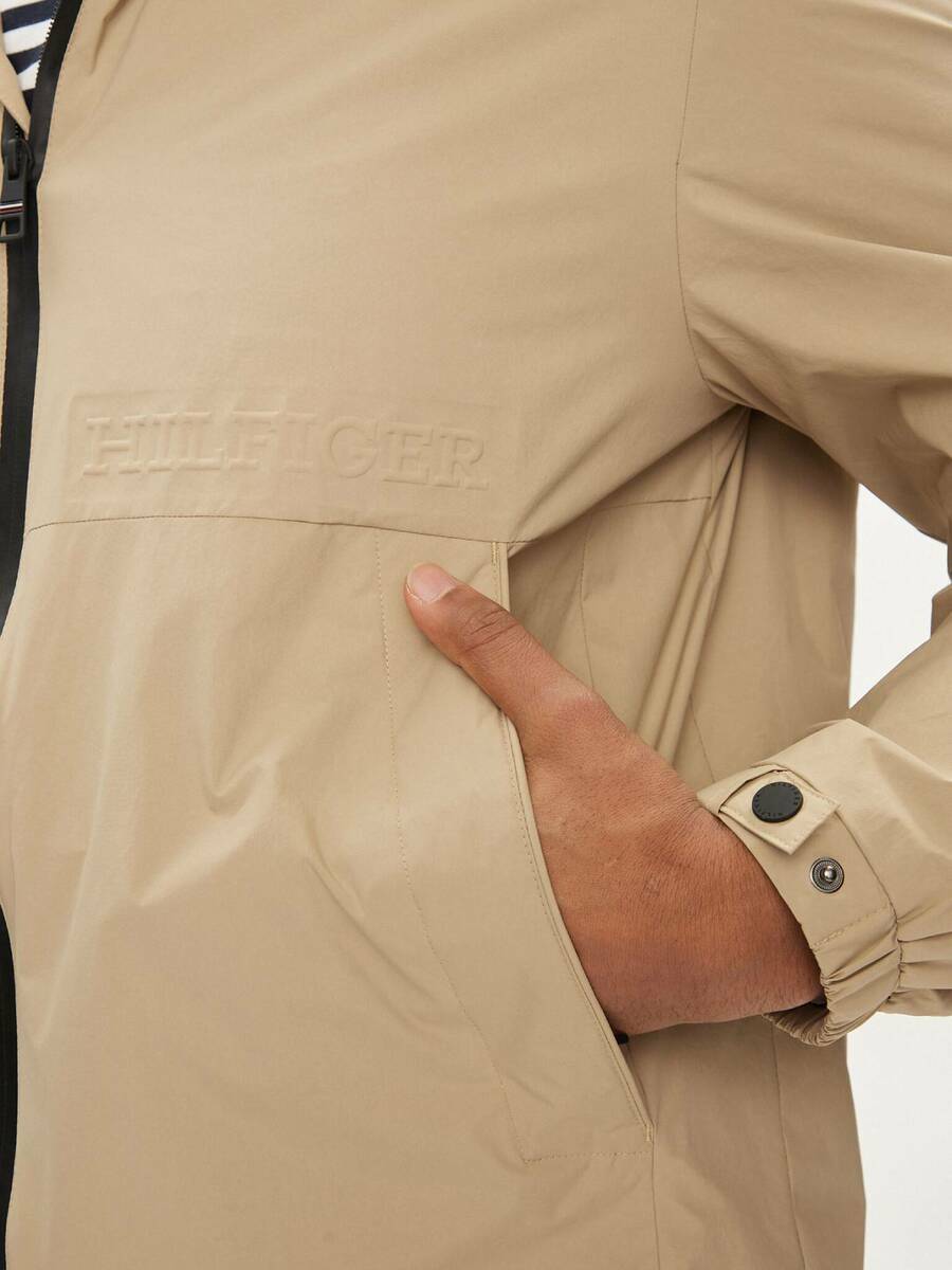 detail Tommy Hilfiger pánská béžová bunda Portland