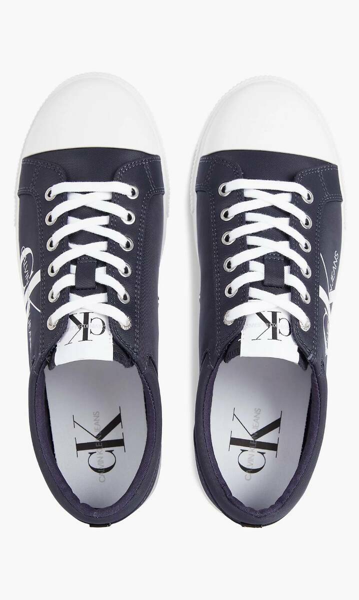 detail Calvin Klein pánské modré plátěné tenisky