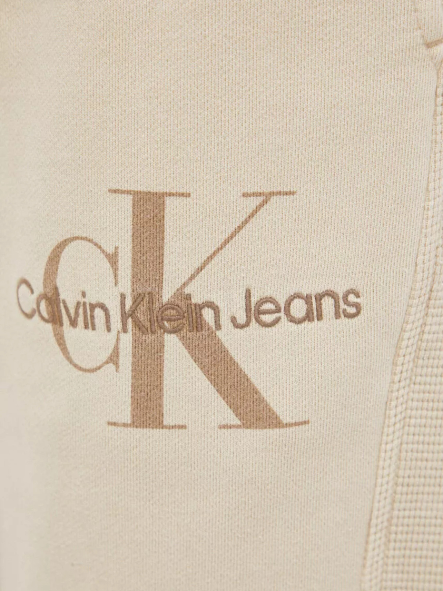detail Calvin Klein pánské béžové tepláky