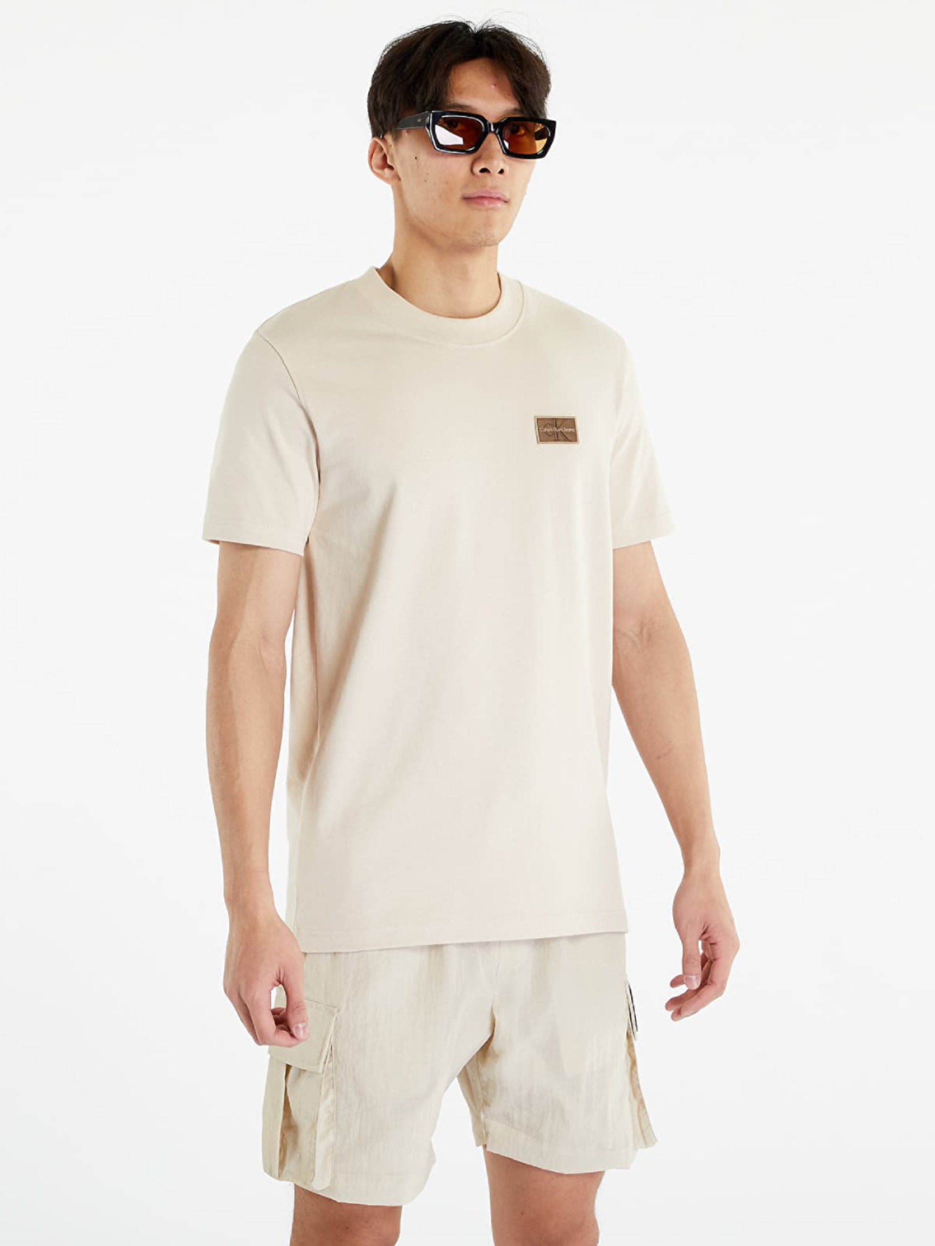 Levně Calvin Klein pánské béžové tričko - XL (ACI)
