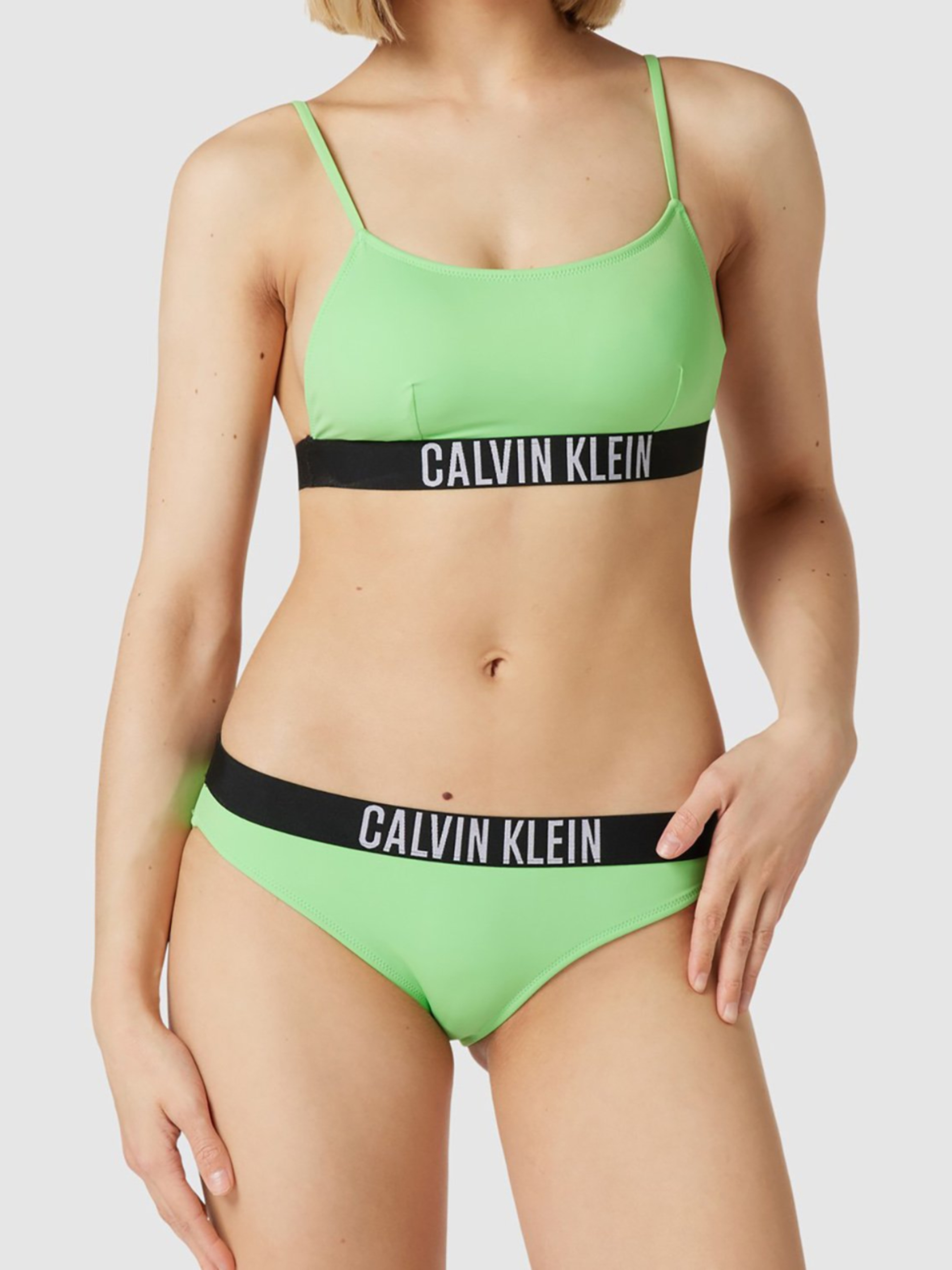 Levně Calvin Klein dámská zelená plavková podprsenka - M (LX0)