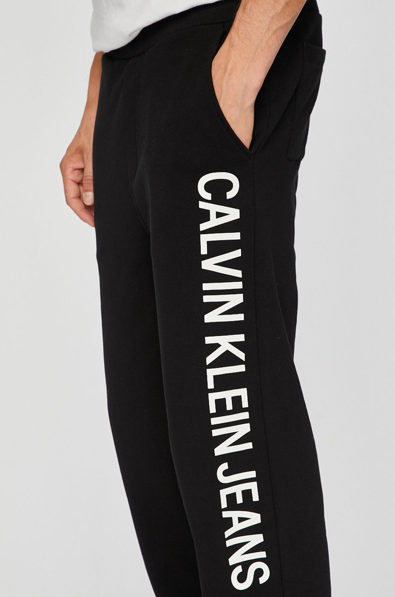 Calvin Klein pánské černé tepláky  - L (099)