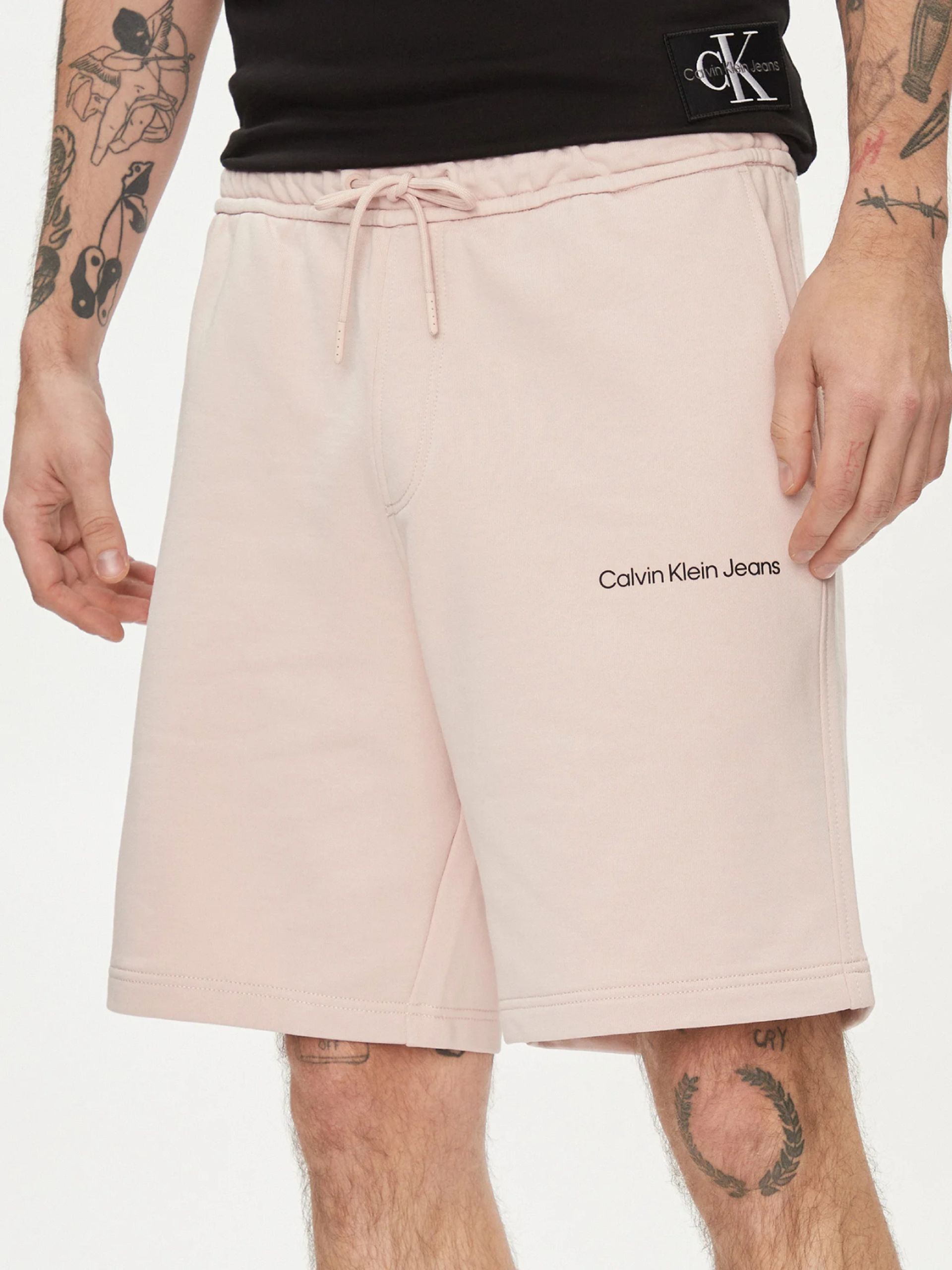 Levně Calvin Klein pánské růžové šortky