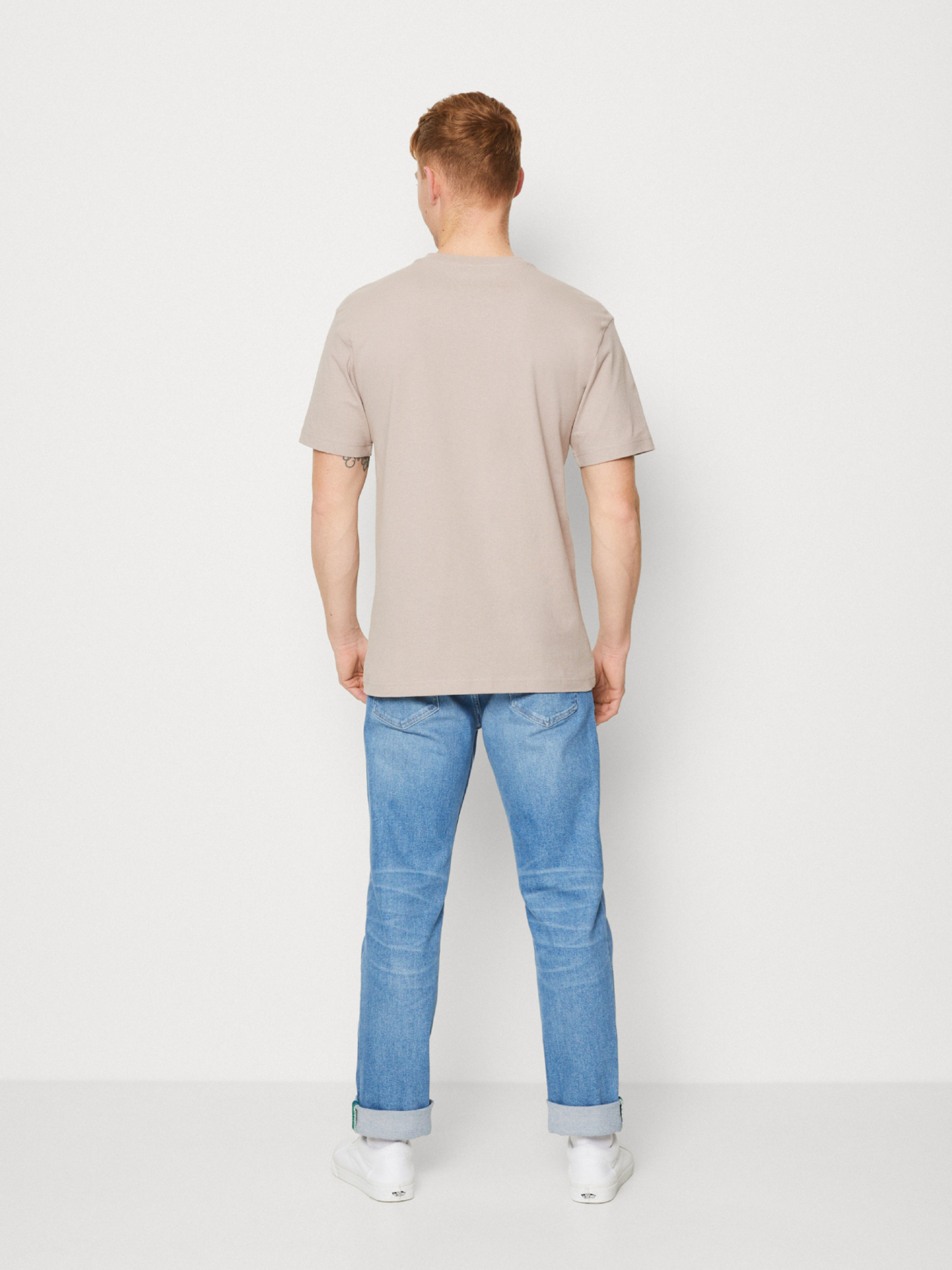 Tommy Jeans pánské béžové triko SIGNATURE - L (RAZ)