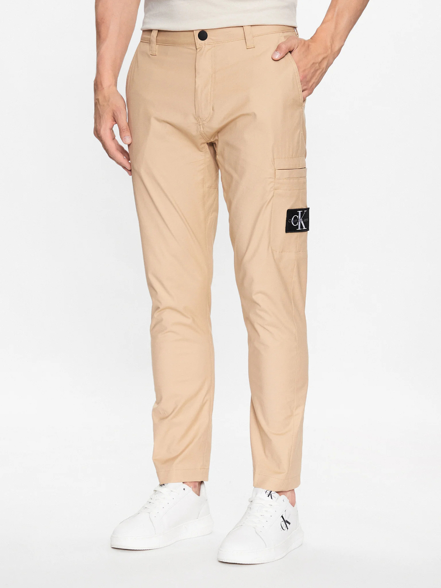 Levně Calvin Klein pánské béžové kalhoty