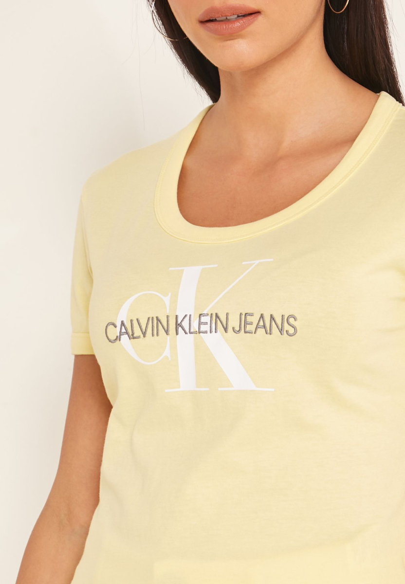 Calvin Klein dámské žluté tričko Baby - XS (ZHH)