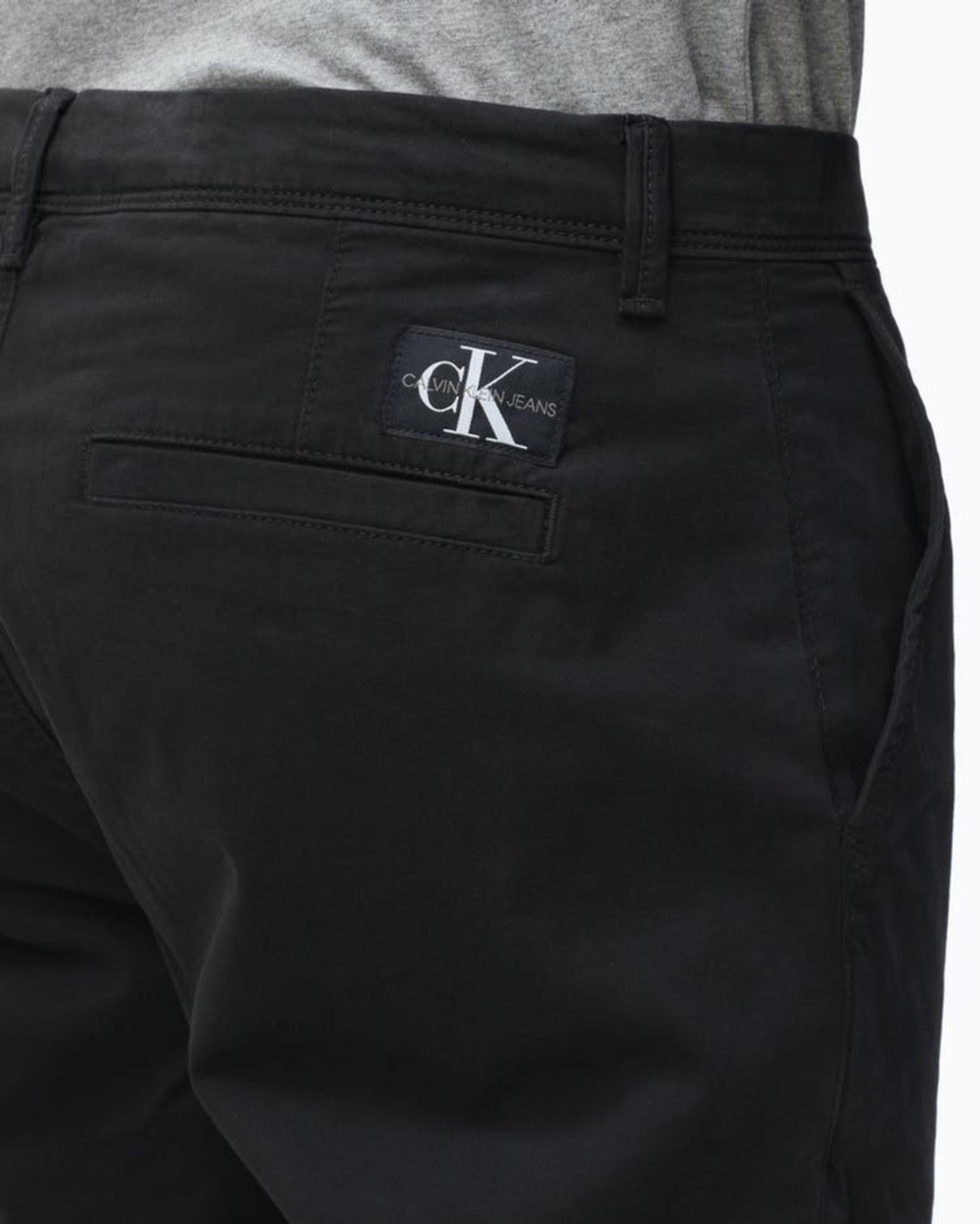Calvin Klein pánské černé kalhoty - 32/32 (BEH)