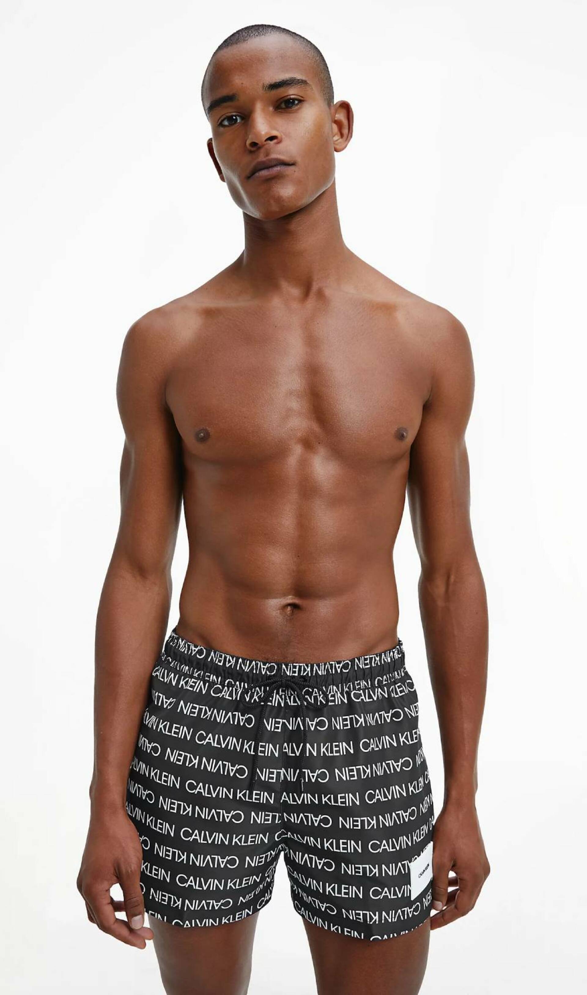 Levně Calvin Klein pánské černé plavky - XL (0GJ)
