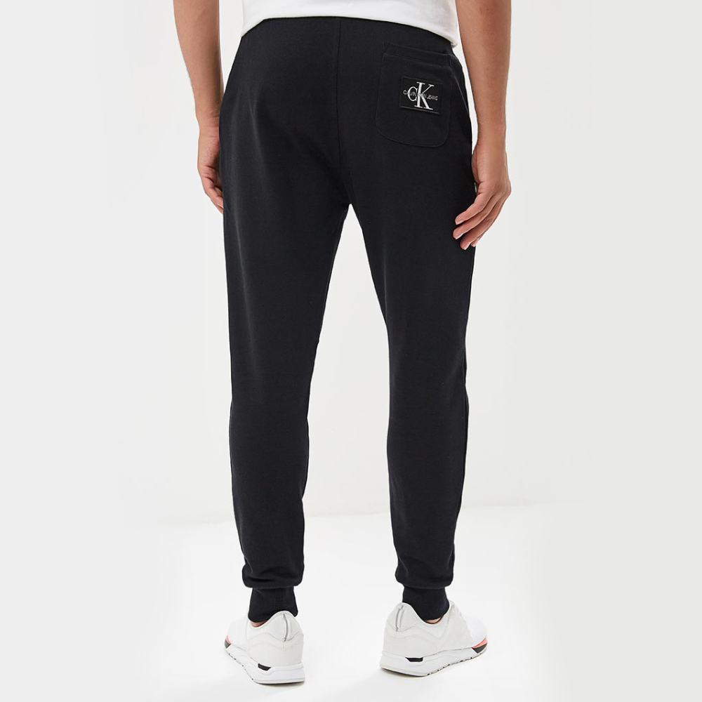 Calvin Klein pánské černé teplákové kalhoty Monogram - S (099)