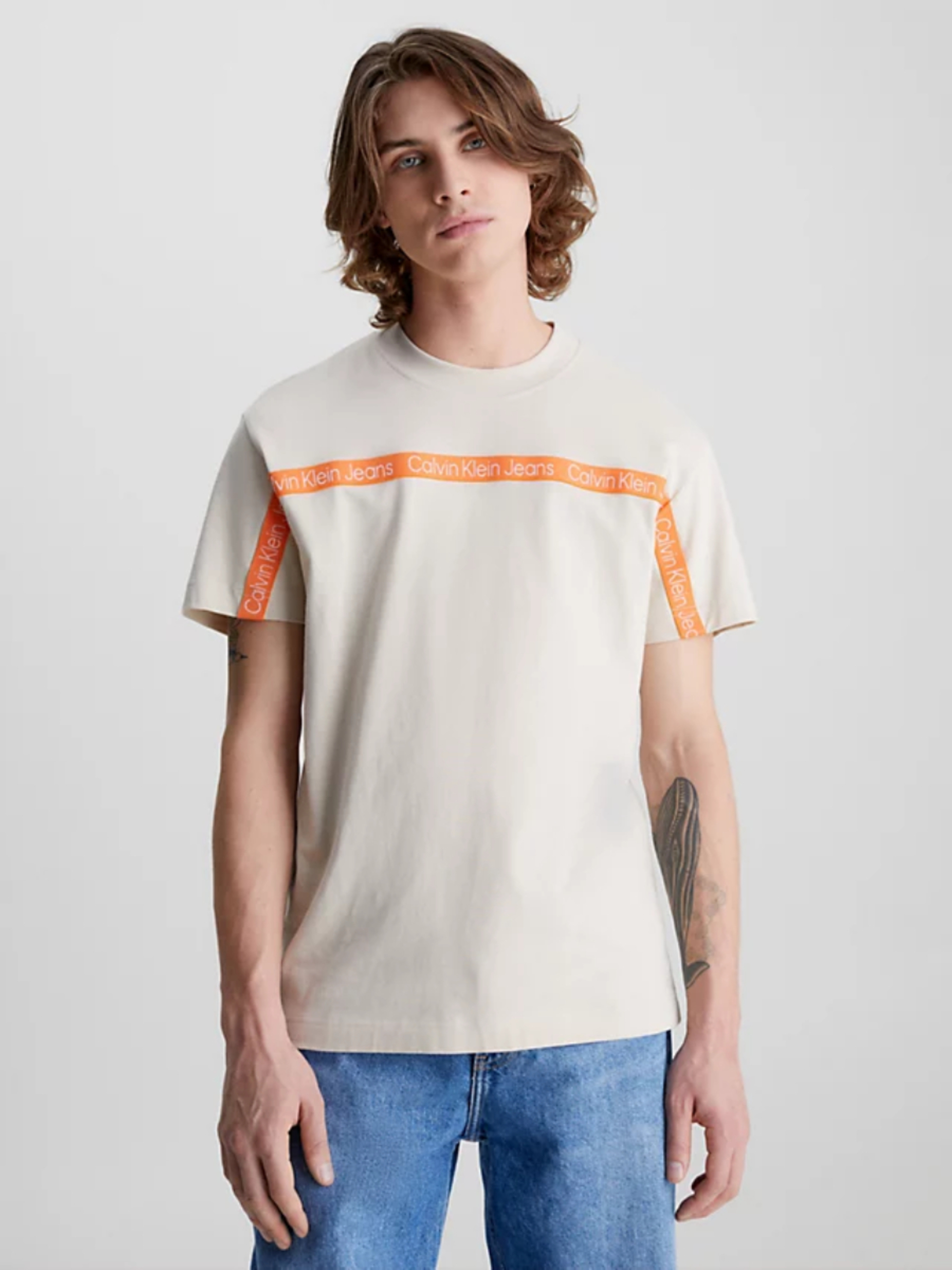 Calvin Klein pánské béžové tričko LOGO TAPE - XL (ACI)