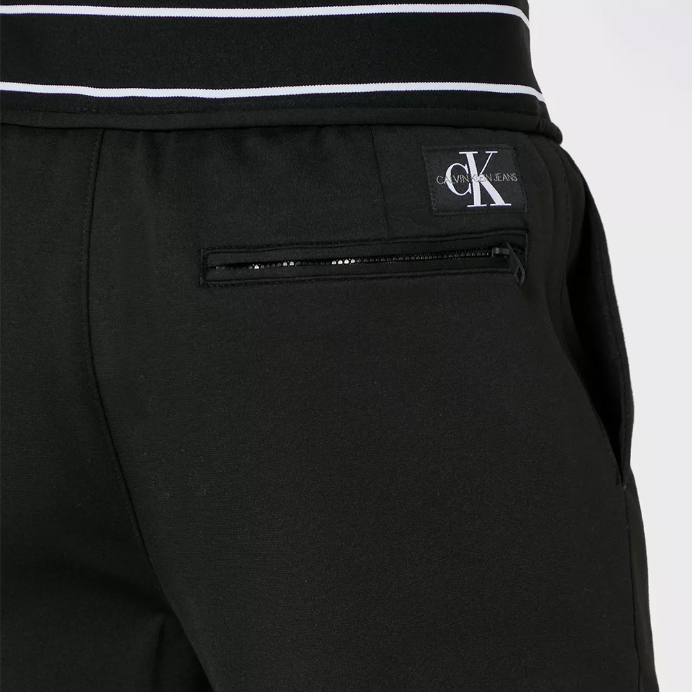 Calvin Klein pánské černé kalhoty - L (BAE)