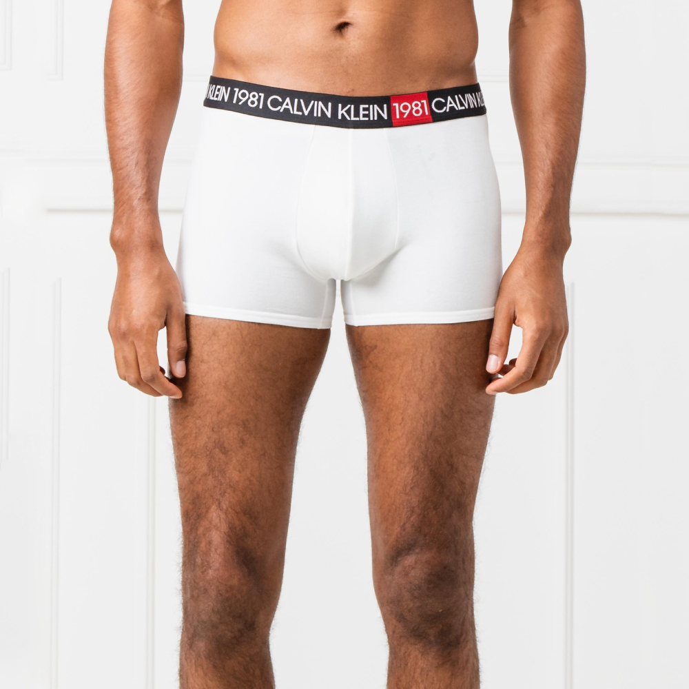 Levně Calvin Klein pánské bílé boxerky - S (100)