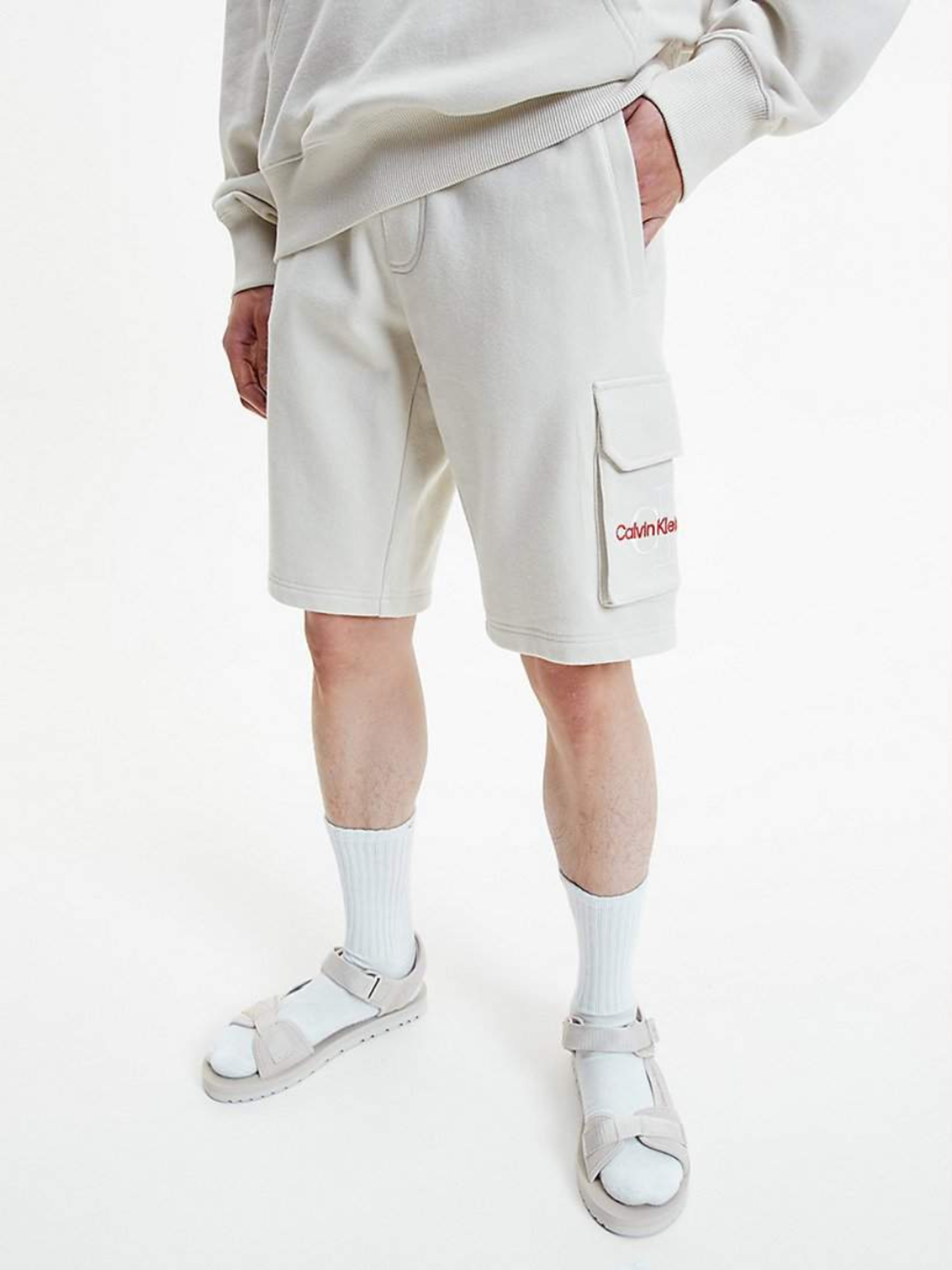 Levně Calvin Klein pánské krémové šortky