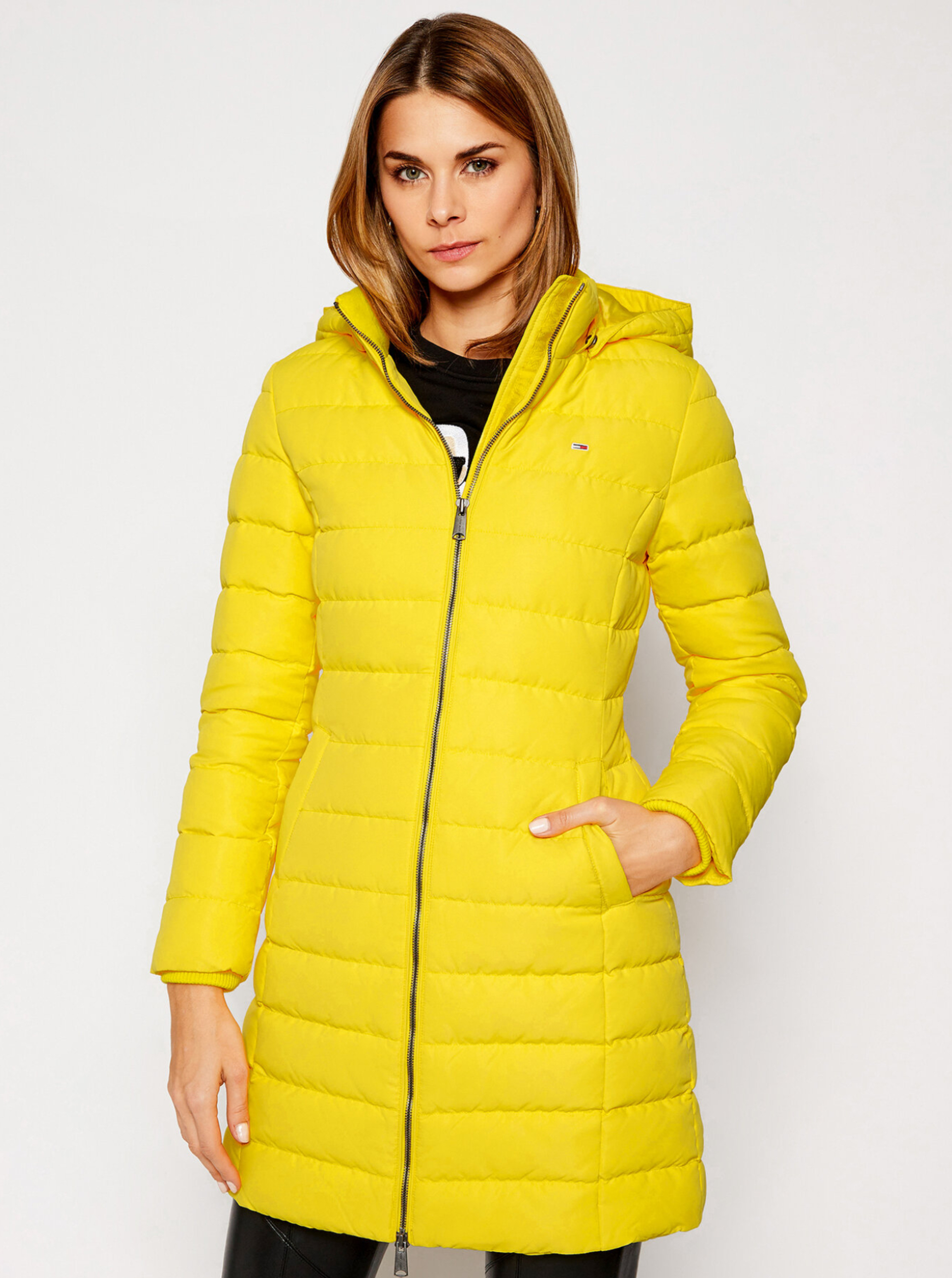 Tommy Jeans dámská žlutá zimní dlouhá bunda
