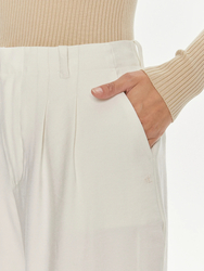 Calvin Klein dámské béžové kalhoty - XS (YBI)