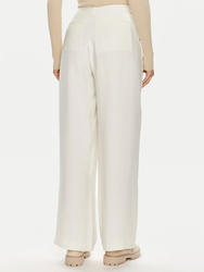Calvin Klein dámské béžové kalhoty - XS (YBI)
