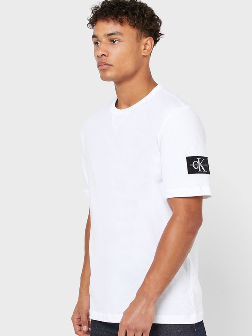 Calvin Klein pánské bílé tričko Badge
