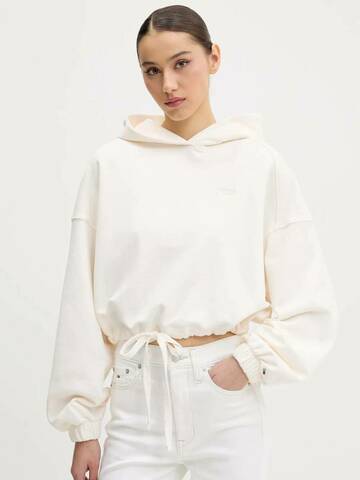 Tommy Jeans dámská smetanová mikina