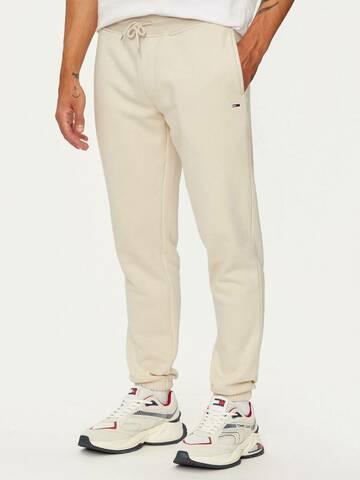 Tommy Jeans pánské smetanové tepláky