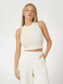 detail Guess dámský krémový top