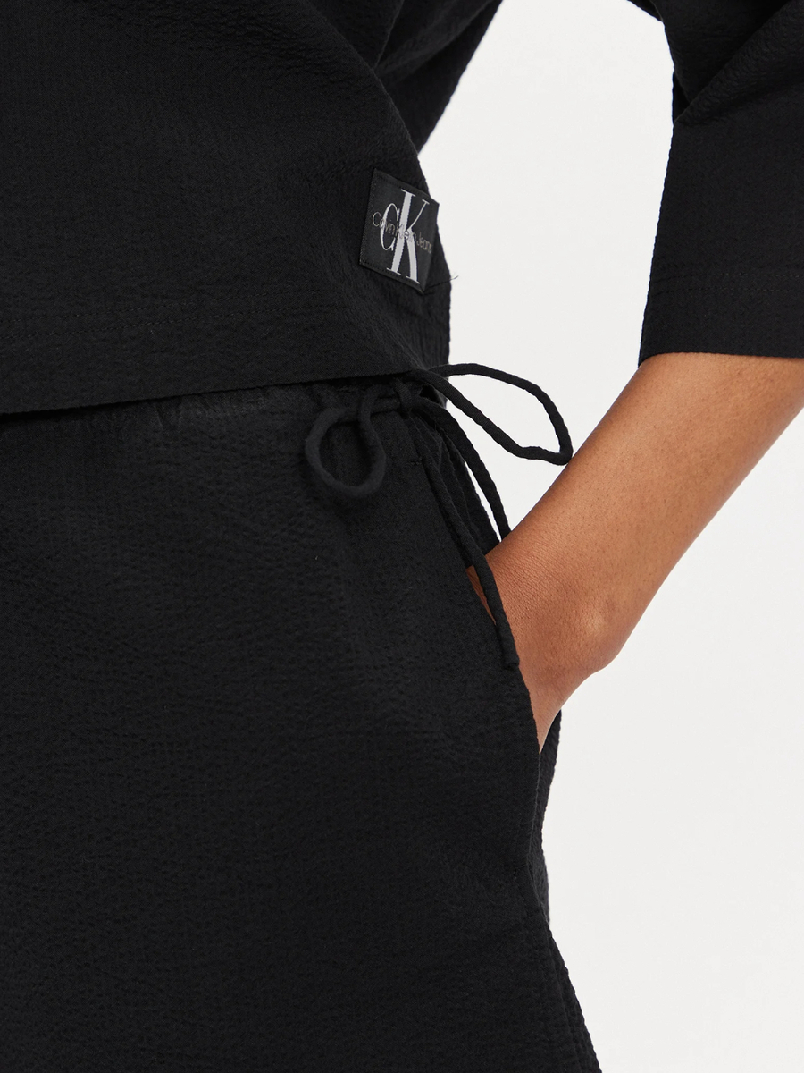 detail Calvin Klein dámské černé šortky