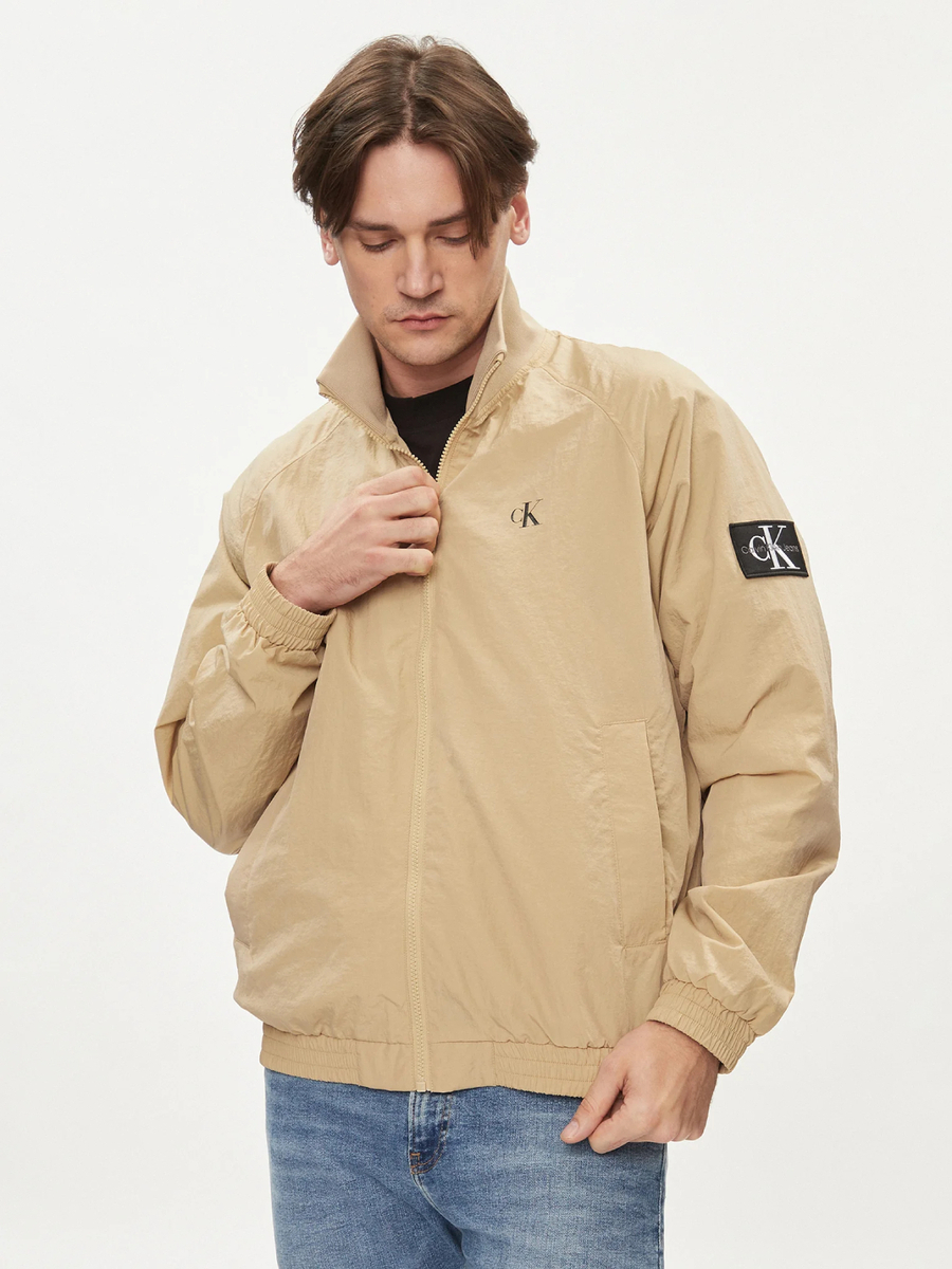 detail Calvin Klein pánská béžová přechodová bunda