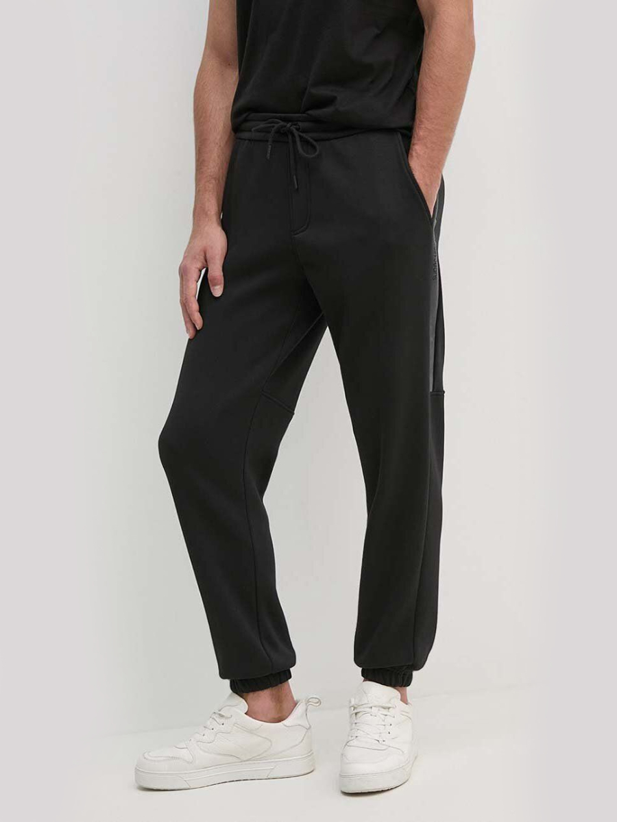 detail Calvin Klein pánské černé tepláky