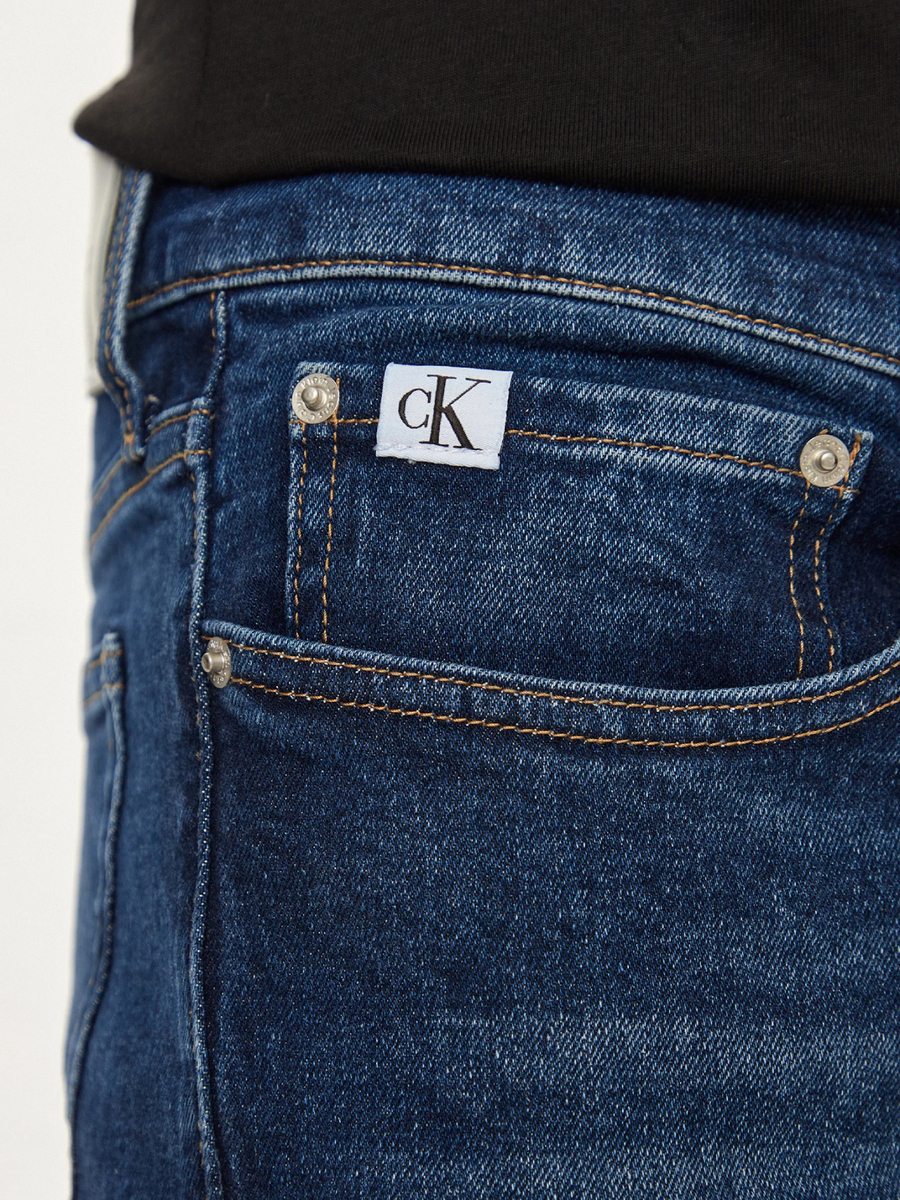 detail Calvin Klein pánské modré džíny