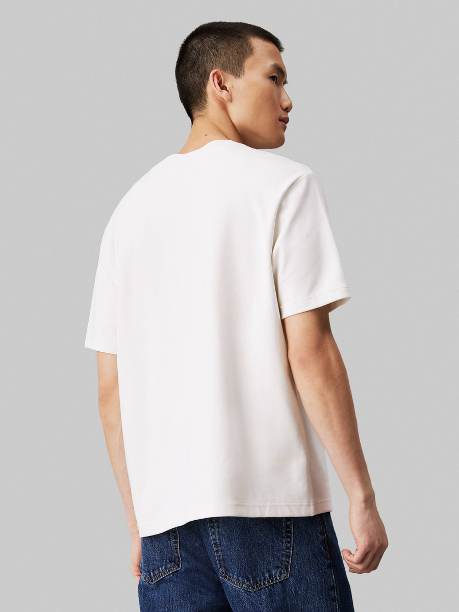 detail Calvin Klein pánské krémové tričko