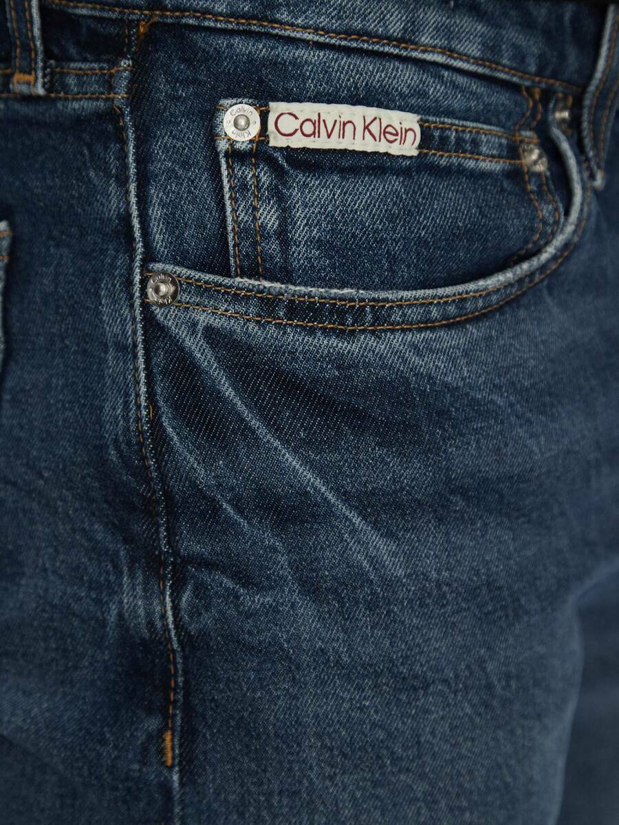 detail Calvin Klein pánské modré džíny