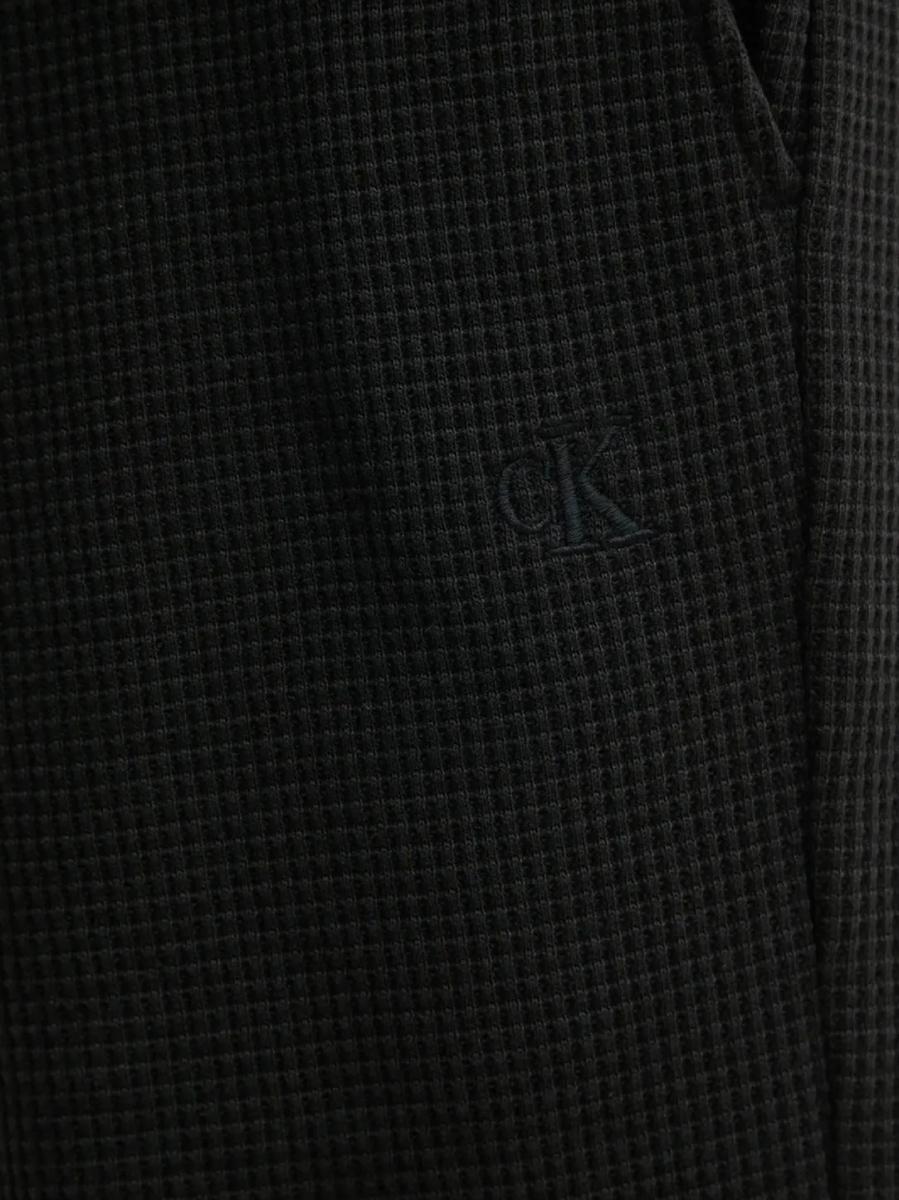 detail Calvin Klein pánské černé šortky