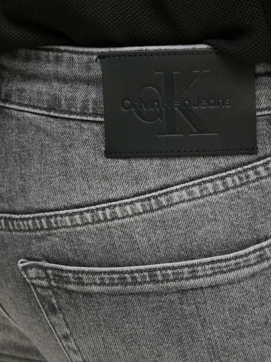 detail Calvin Klein pánské šedé džíny