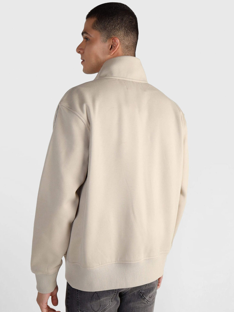 detail Calvin Klein pánská béžová mikina