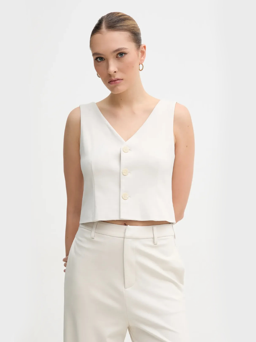 detail Calvin Klein dámská béžová vesta