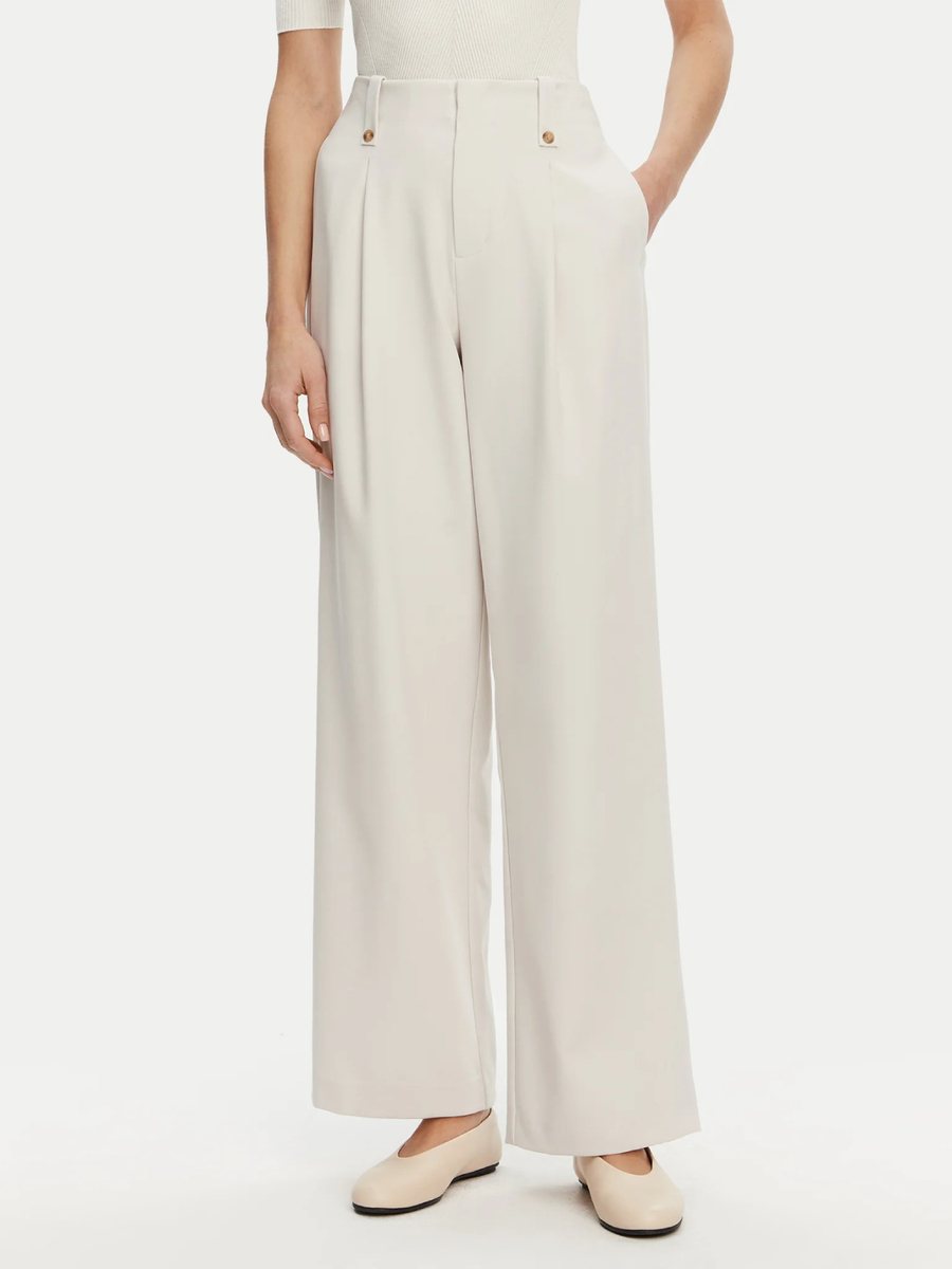 detail Calvin Klein dámské béžové kalhoty