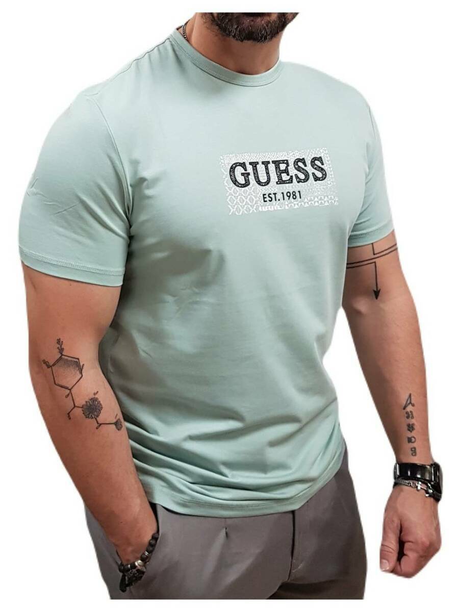 detail Guess pánské světle zelené tričko