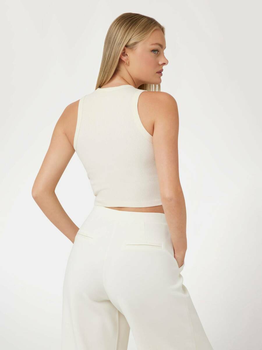 detail Guess dámský krémový top