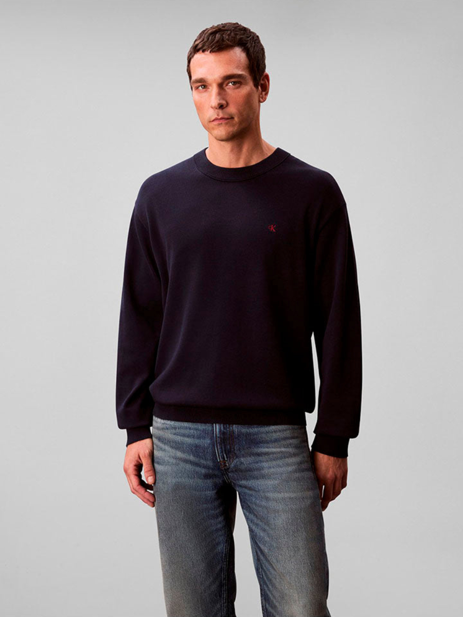 detail Calvin Klein pánský modrý svetr