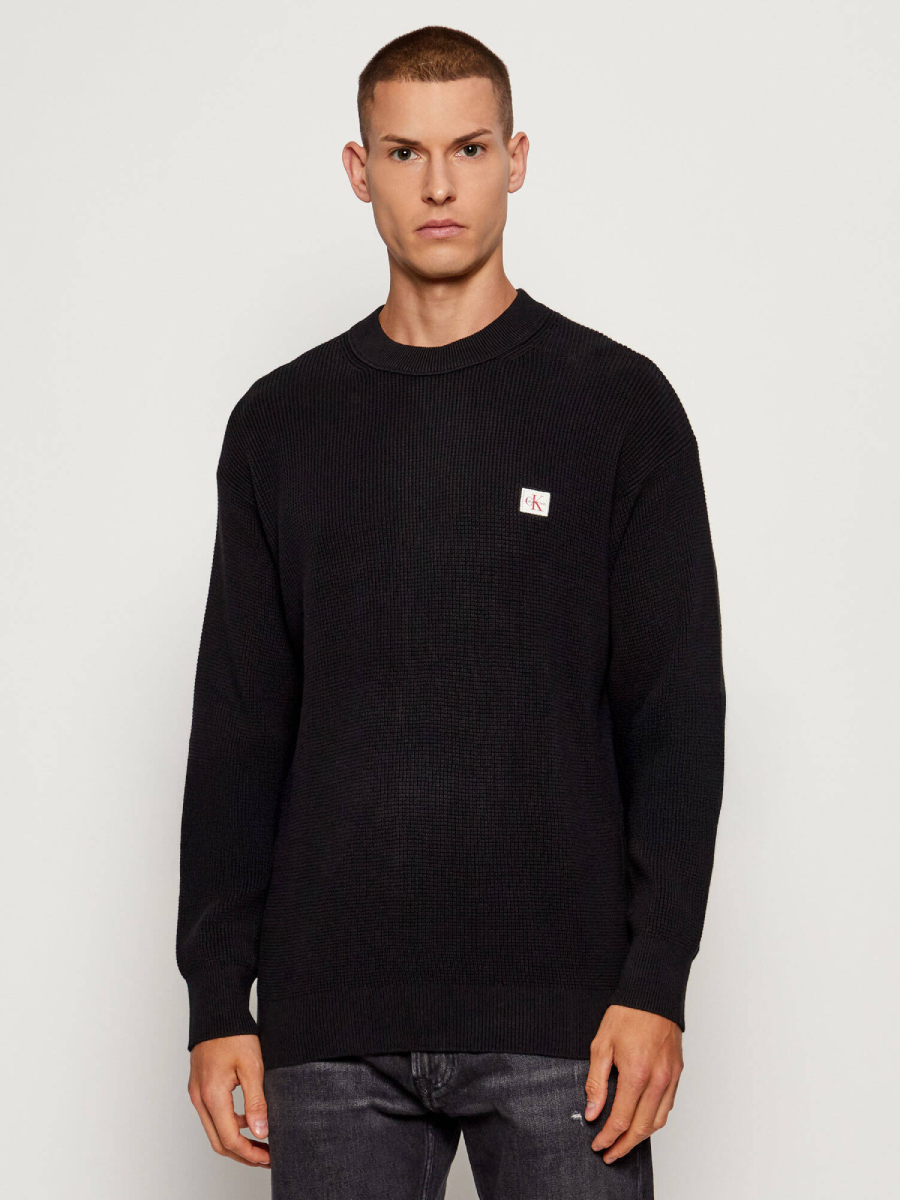 detail Calvin Klein pánský černý svetr