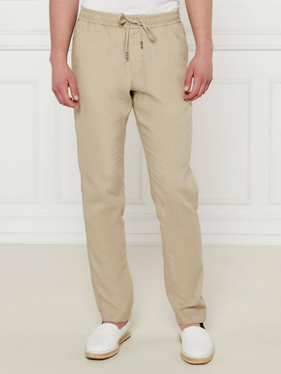 detail Tommy Hilfiger pánské béžové kalhoty