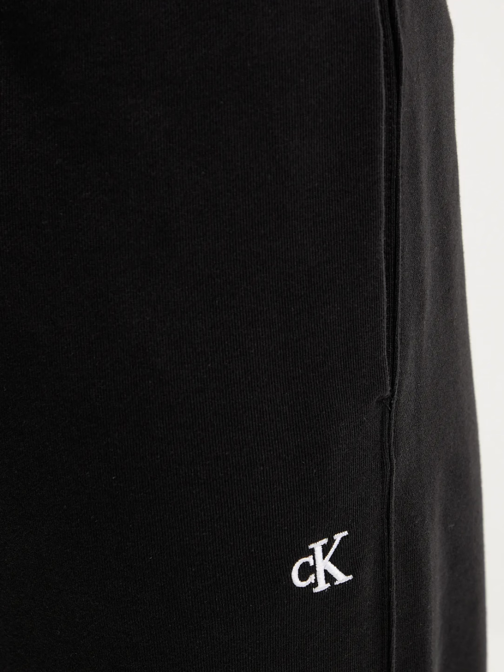 detail Calvin Klein pánské černé tepláky