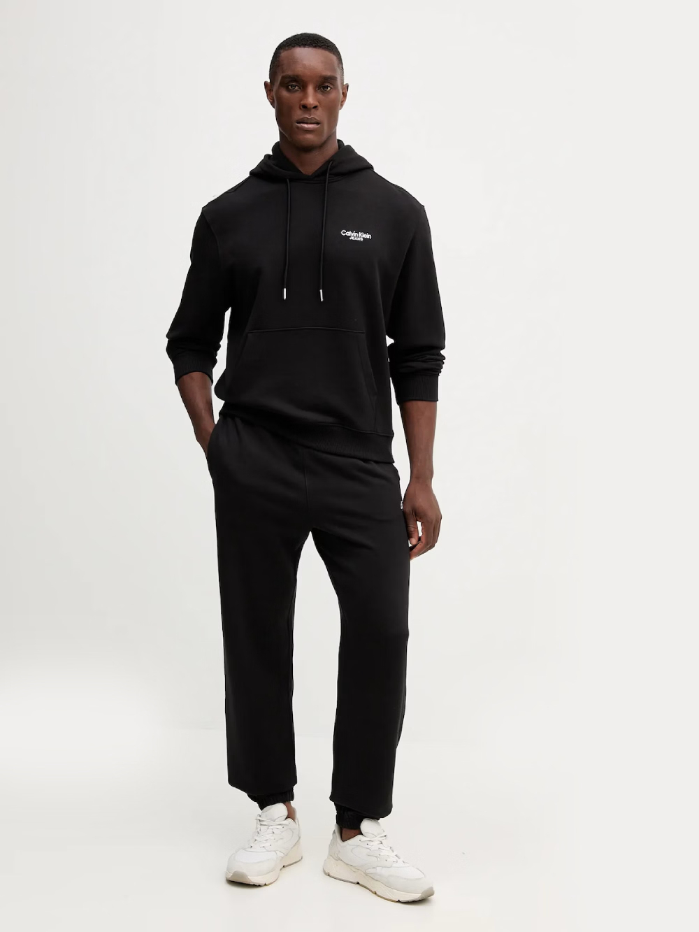detail Calvin Klein pánské černé tepláky