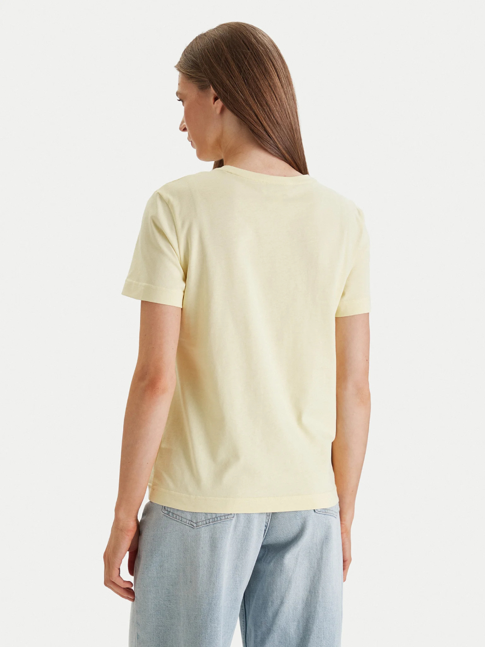 detail Calvin Klein dámské žluté tričko