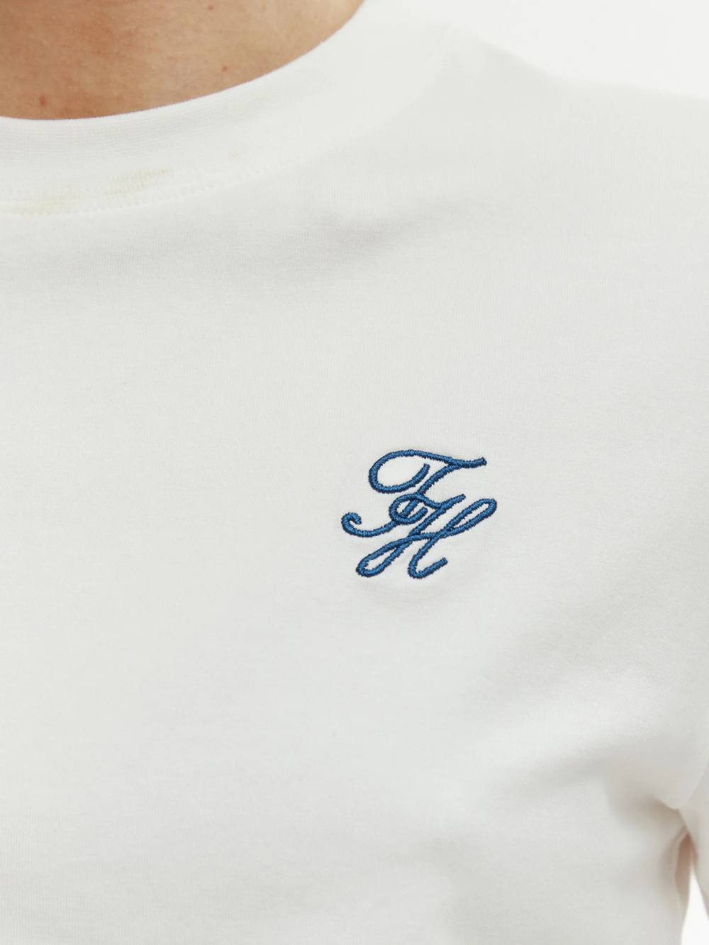 detail Tommy Hilfiger dámské bílé tričko
