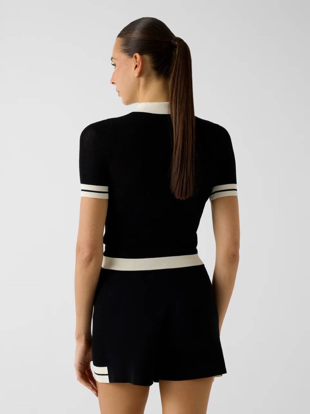 detail Guess dámský černý polo svetr
