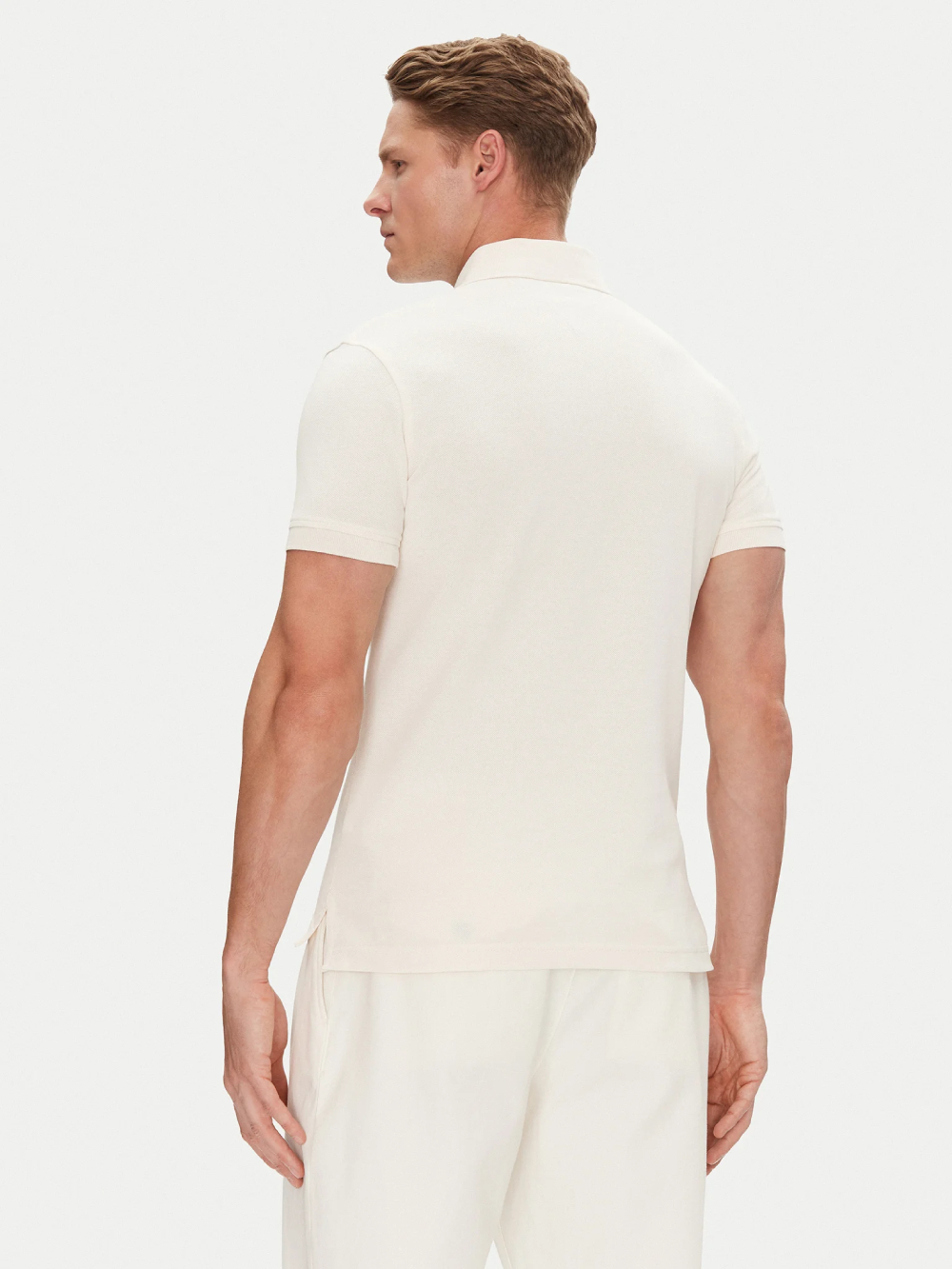 detail Tommy Hilfiger pánské krémové polo tričko